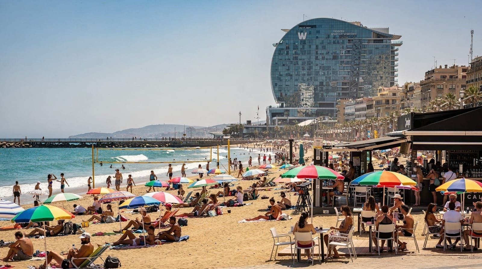 Barcelona beaches in summer: what to expect and where to go — What Barcelona's beaches are actually like in summer — crowded Barceloneta, quie